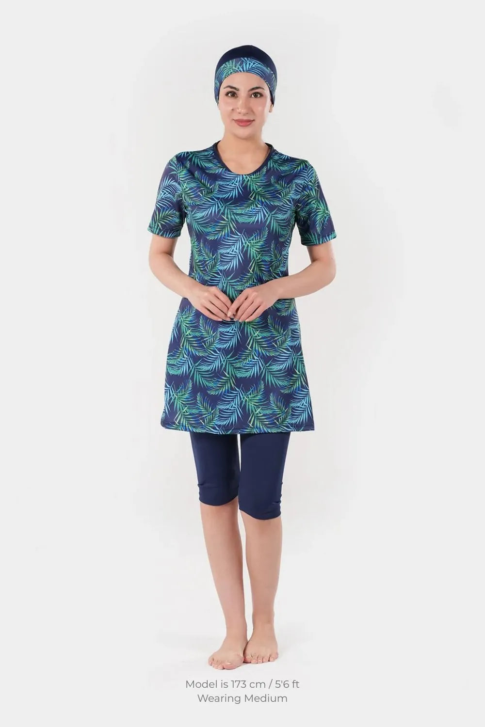 Women’s leaf printed lycra swimwear by BAE Modest featuring short sleeves and a stylish, comfortable design for swimming and beach wear.