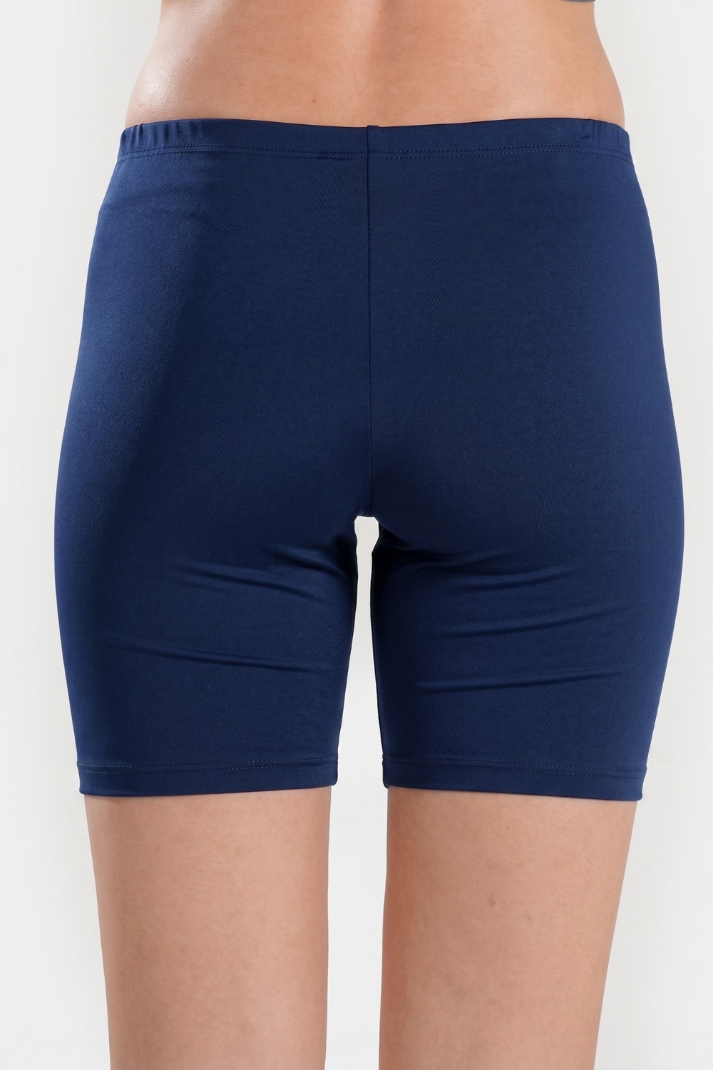Women’s high waisted modest swim shorts by BAE Modest, quick-drying mid-thigh swimming bottoms for comfortable beachwear.