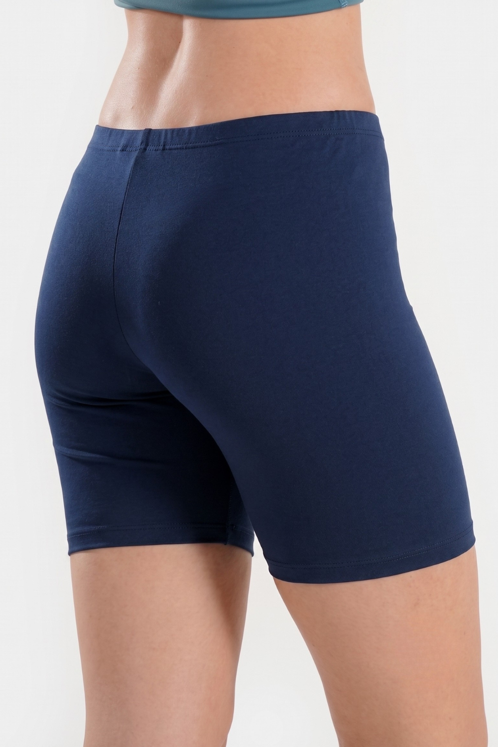 Women’s high waisted modest swim shorts by BAE Modest, quick-drying mid-thigh swimming bottoms for comfortable swimwear.
