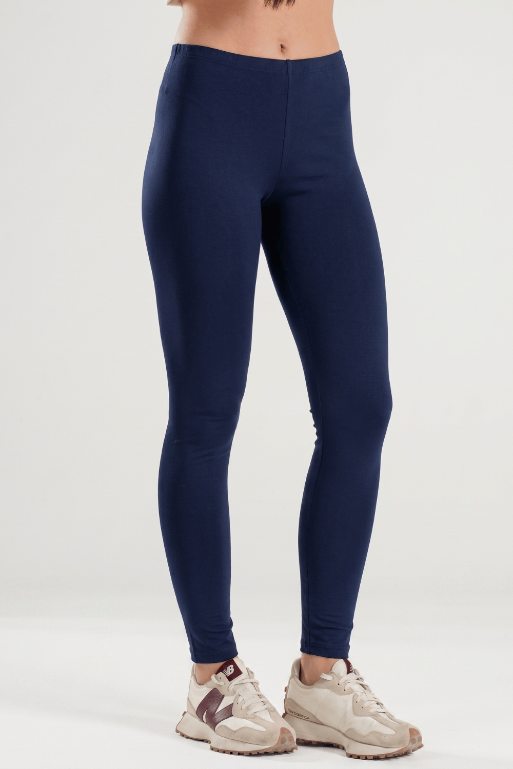 Women’s BAE Modest swim leggings with UPF 50+ sun protection, full-length swim tights for modest swimwear and sun protection.