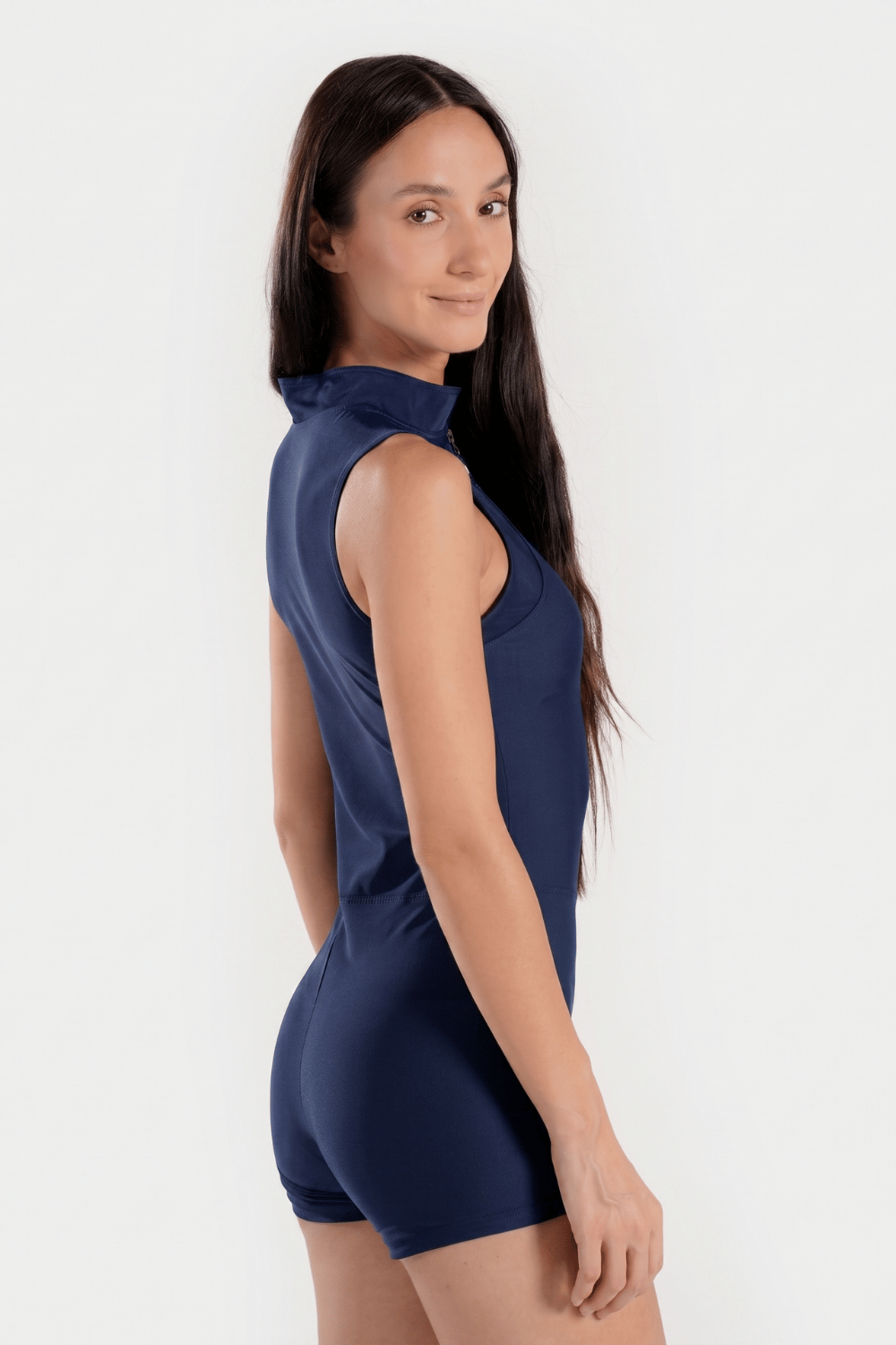 Bae Modest one-piece mid-thigh athletic sleeveless swimsuit with sporty design, suitable for swimming and active water sports.