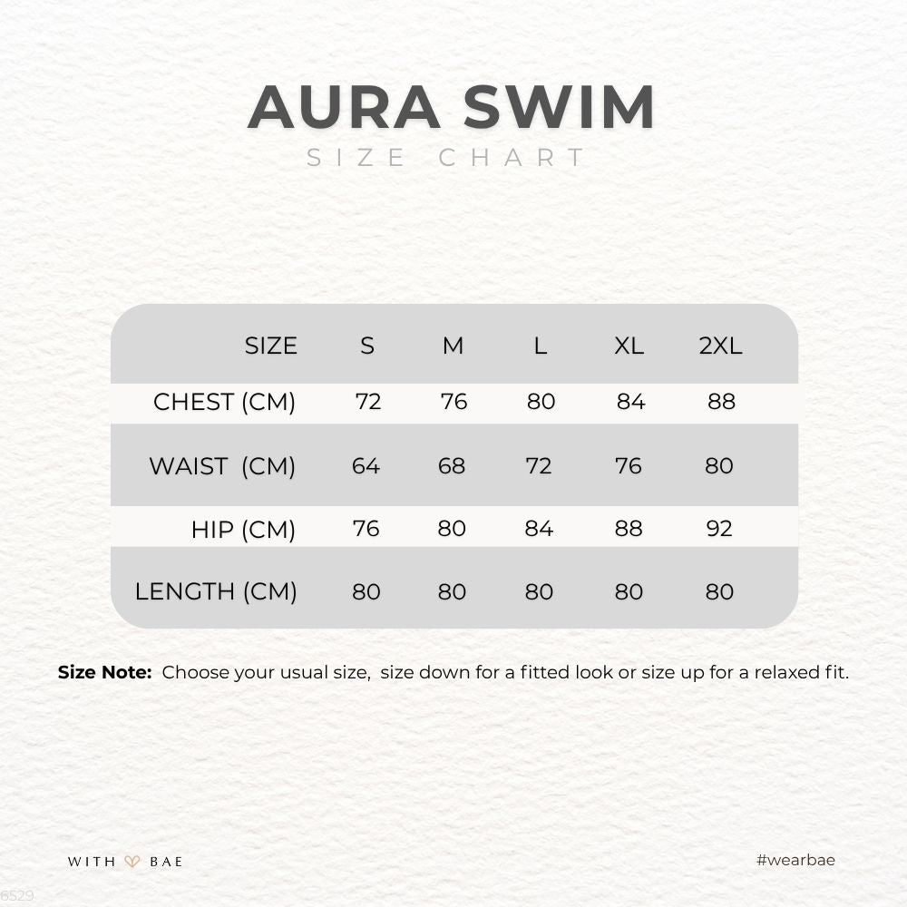 Women’s slimming side-panel swimsuit by BAE Modest, featuring a sleek design and supportive fit, perfect for swimwear.