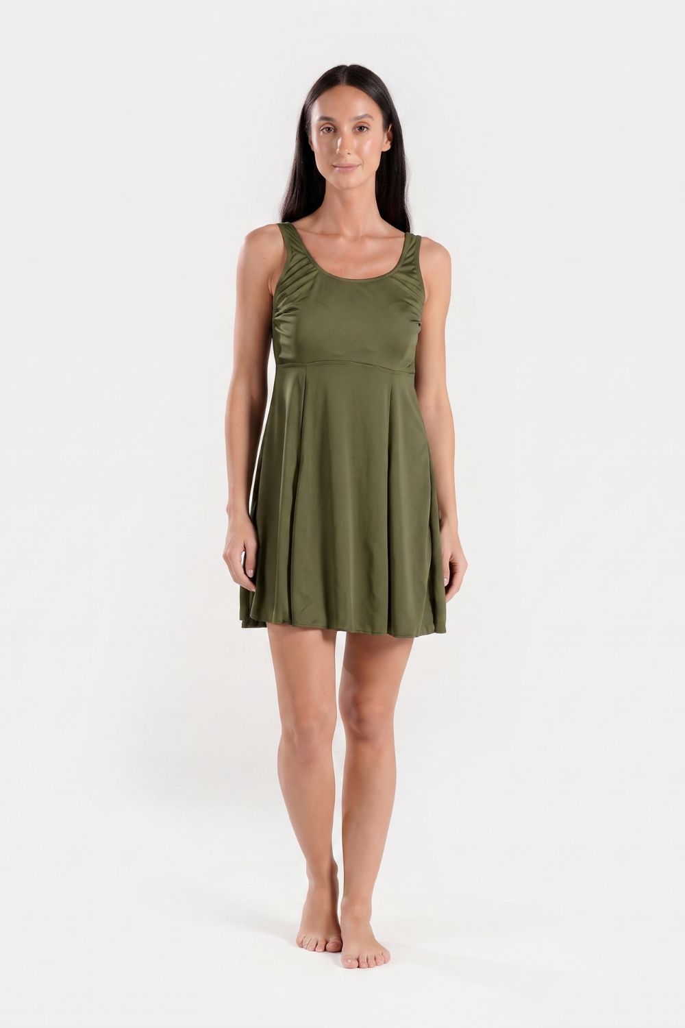 Women's green BAE Modest swimming dress with built-in shorts, full-coverage modest swimwear for women.