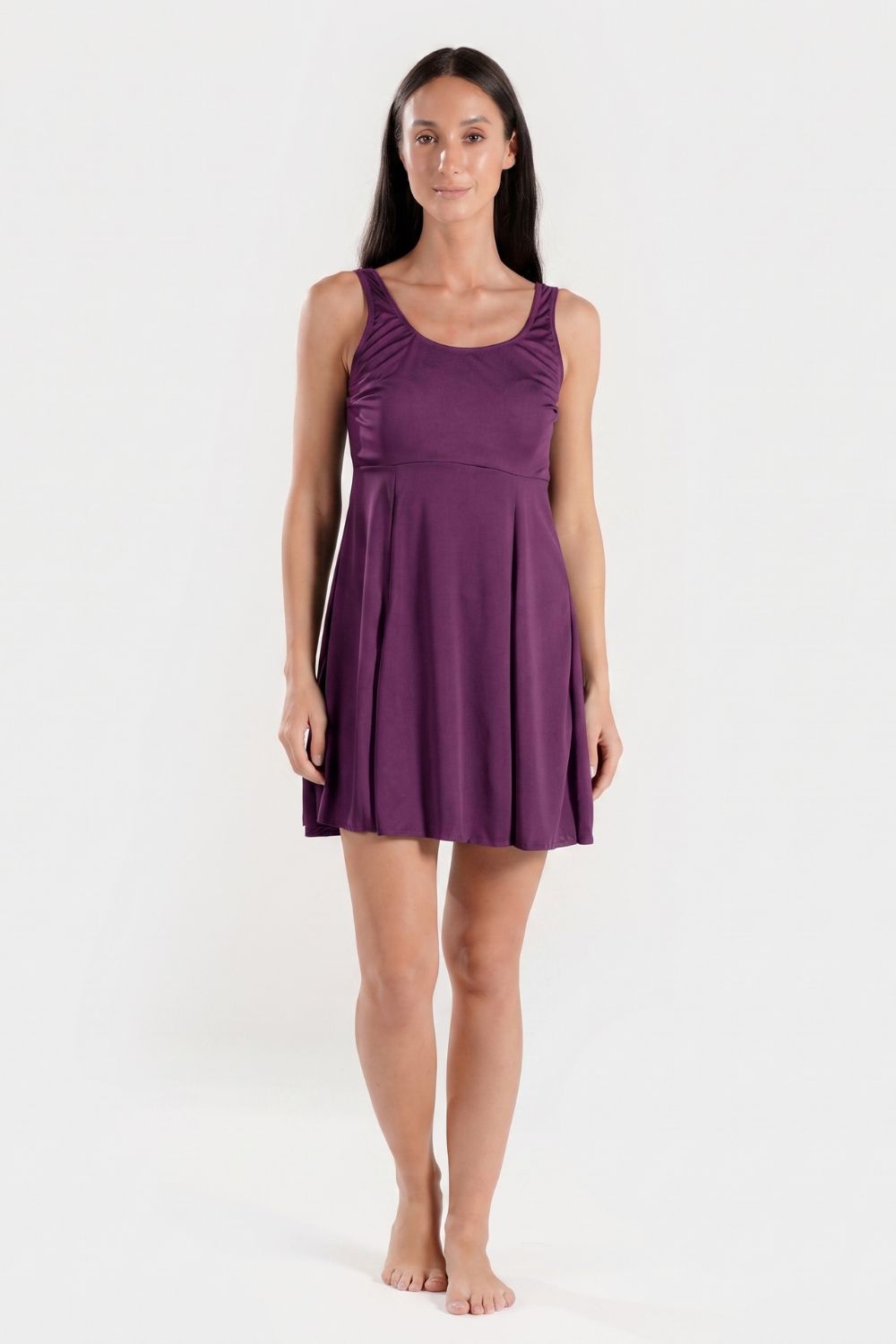 Purple BAE Modest women's swim dress with built-in shorts, designed for comfortable modest swimming attire.
