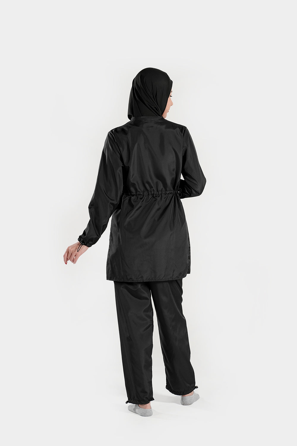Burkini modest swimsuit by BAE Modest with half-length sleeves, full coverage, and matching hijab, suitable for swimming.