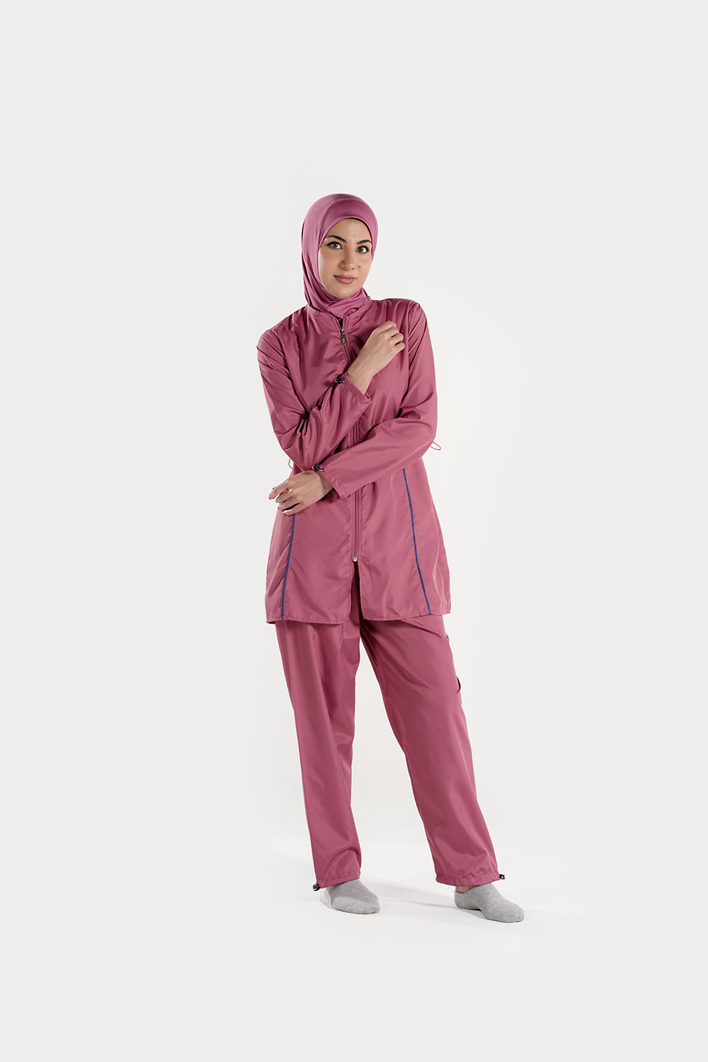 Modest BAE Modest burkini swimsuit with half-length sleeves and hijab, designed for full coverage and comfortable swimming.