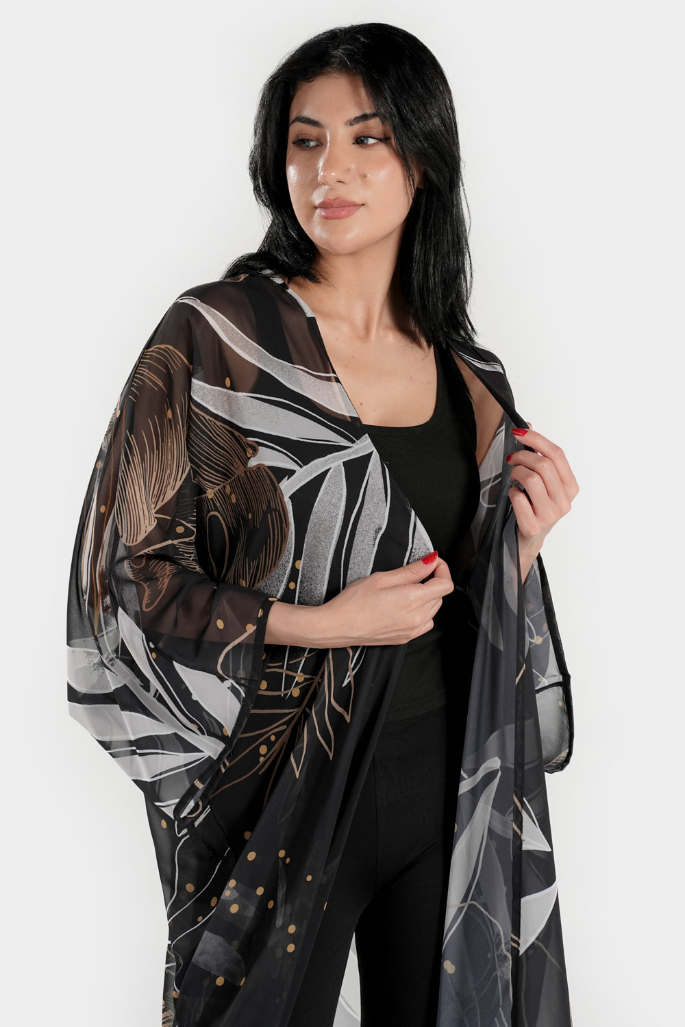 Black and white coral kimono cover-up by BAE Modest, featuring flowing fabric and intricate coral patterns.
