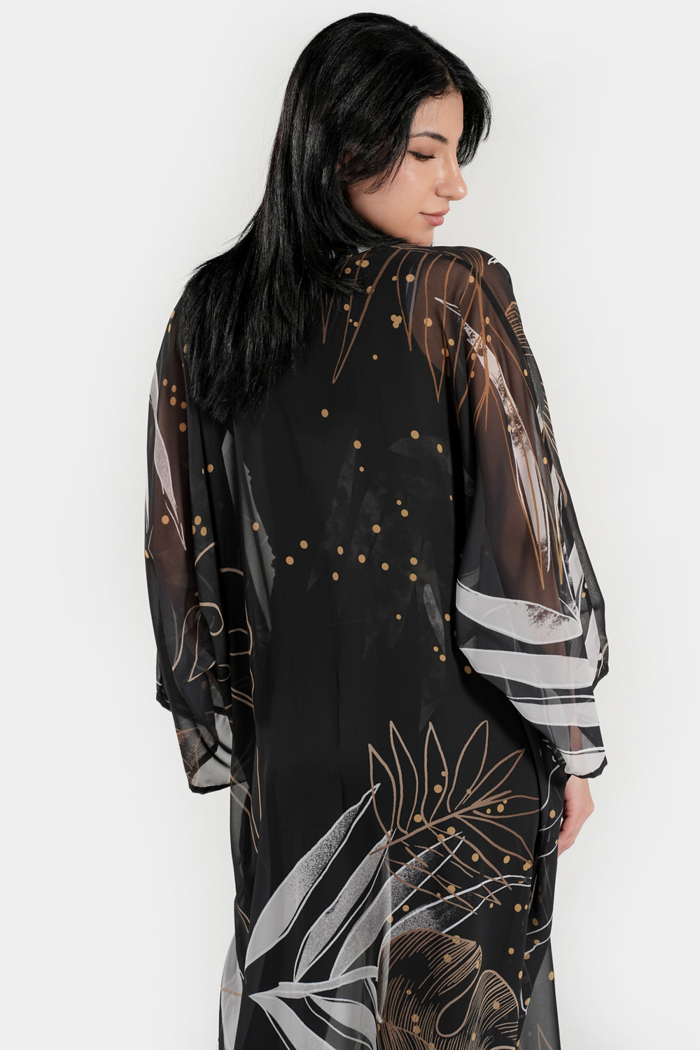 Black and white coral kimono cover-up by BAE Modest, featuring flowing fabric and intricate coral pattern.