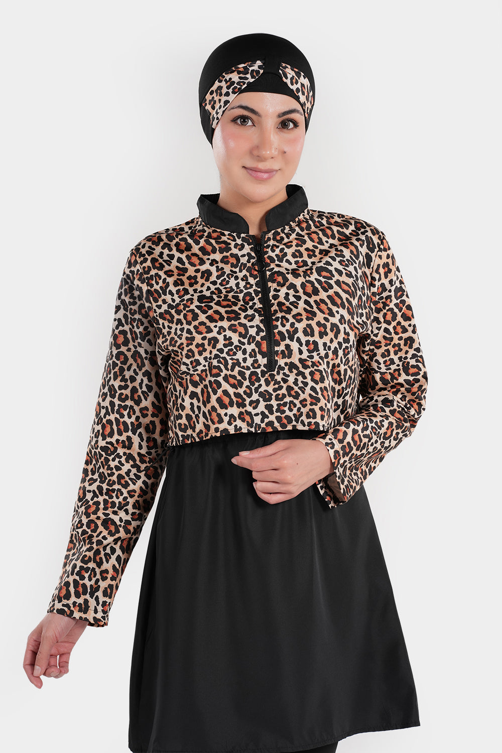 Leopard print BAE Modest waterproof 3-piece swimwear set with modest coverage, including top, bottom, and cover-up.