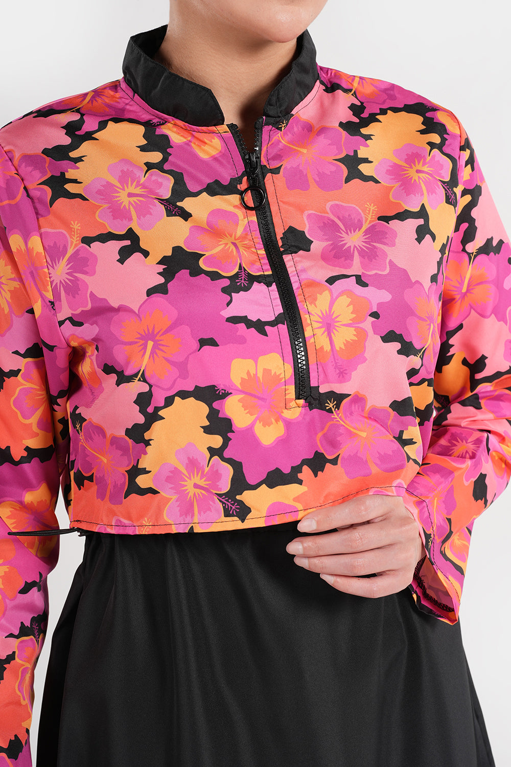 Women’s modest swimwear set with printed top by BAE Modest, featuring full coverage design and colorful floral pattern.