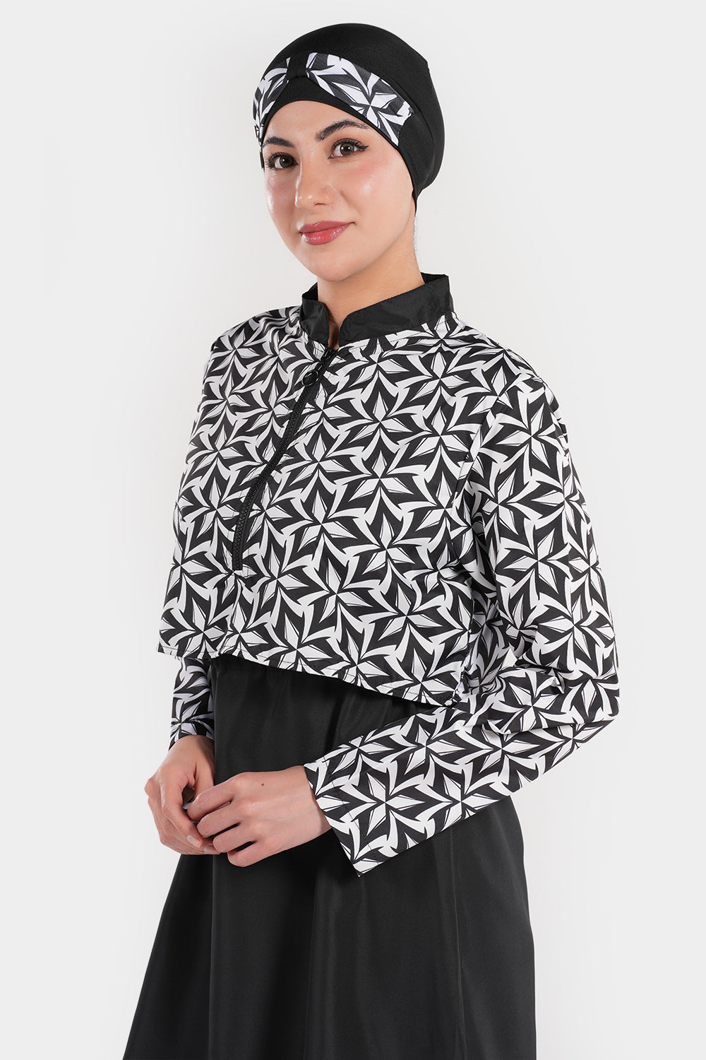 Women’s BAE Modest swimwear set with printed top, featuring full coverage and stylish design for comfortable swimming.