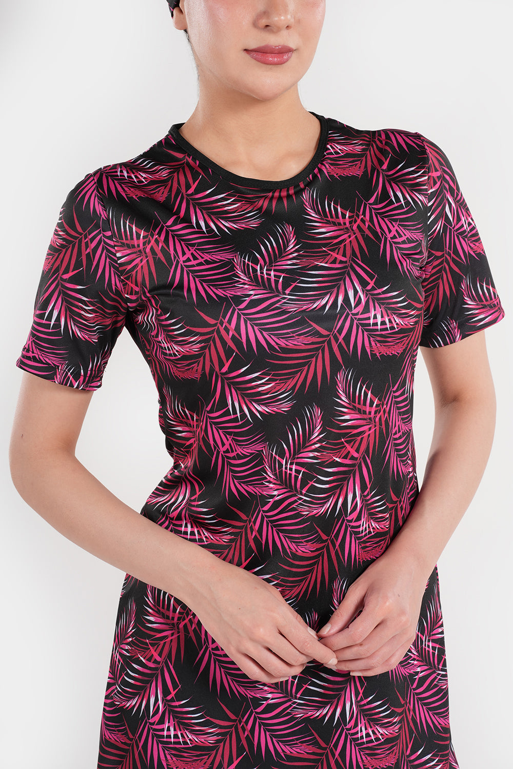 Women’s leaf printed short-sleeve swimwear by BAE Modest, featuring a stylish design and comfortable fit for swimming or beachwear.