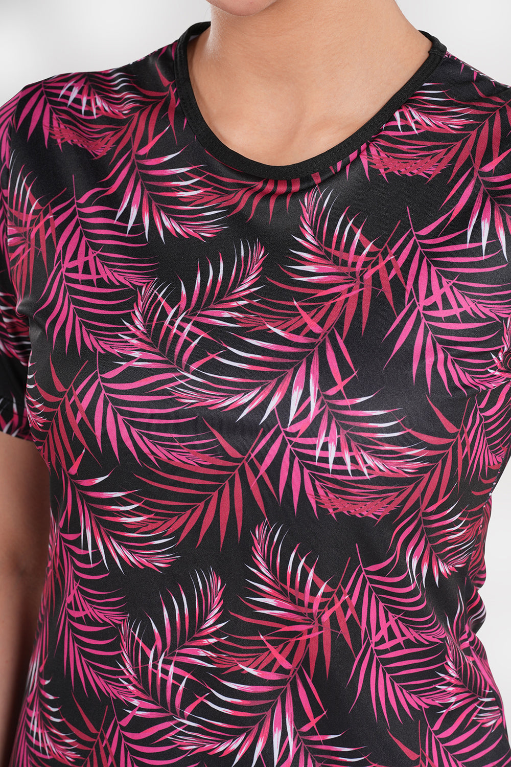 Women’s leaf printed short-sleeve swimwear by BAE Modest, featuring a stylish design and comfortable fit for beach or pool.