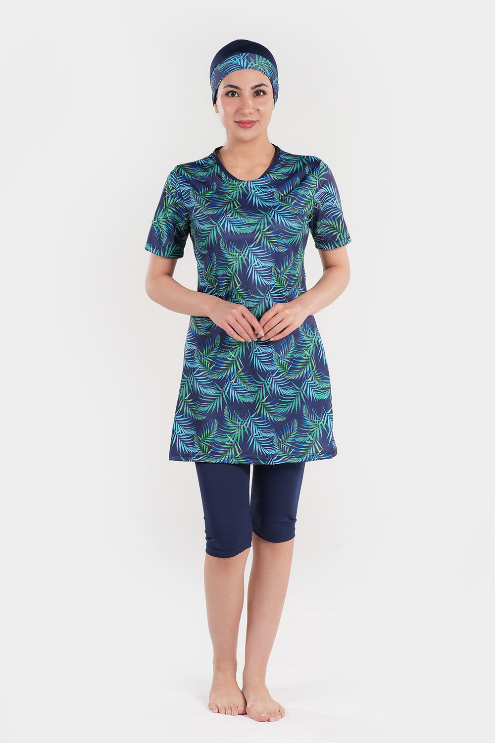 Women’s leaf printed short-sleeve swimwear by BAE Modest, featuring a stylish design and comfortable fit for beach or pool.