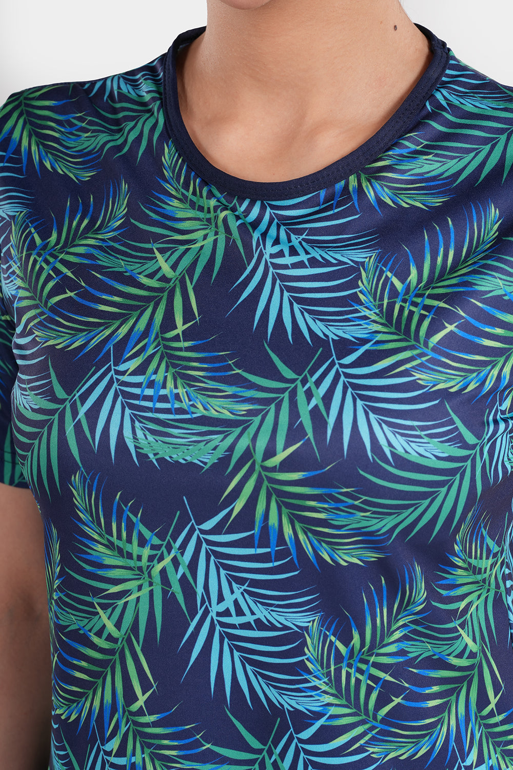 Women’s leaf printed short-sleeve swimwear by BAE Modest, featuring a stylish leaf pattern and comfortable fit.