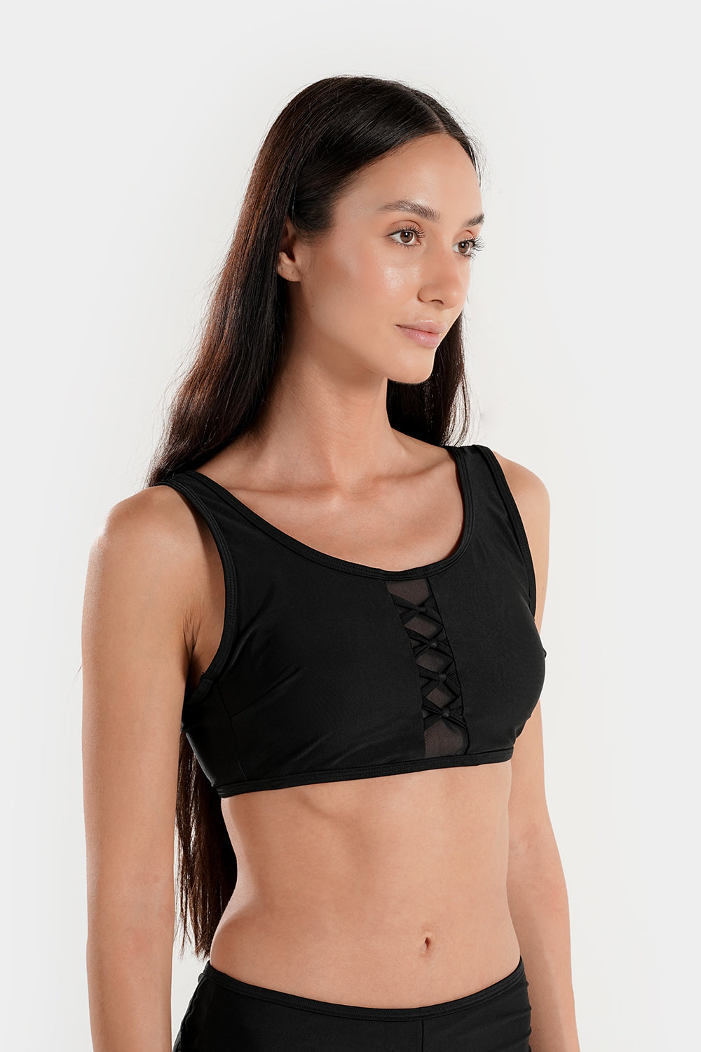 Women’s high-waisted bikini set with lattice mesh detail and sporty shorts by BAE Modest, featuring a stylish two-piece swimwear design.