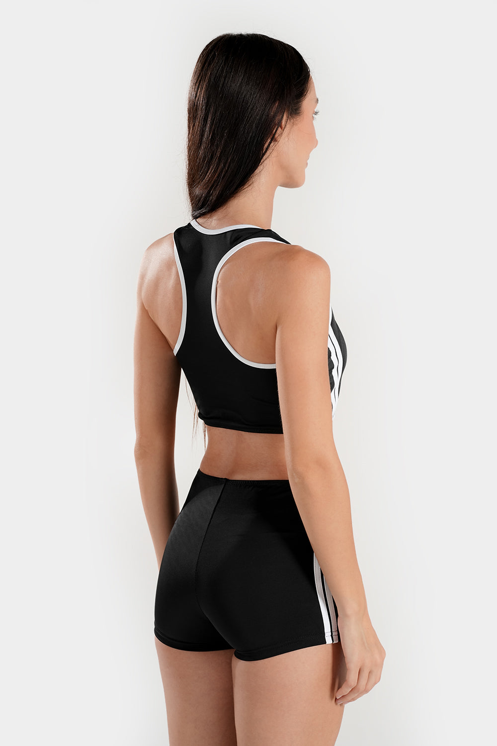 Women's BAE Modest varsity athletic two-piece bikini swimsuit with sporty design and supportive top, ideal for active swimming.