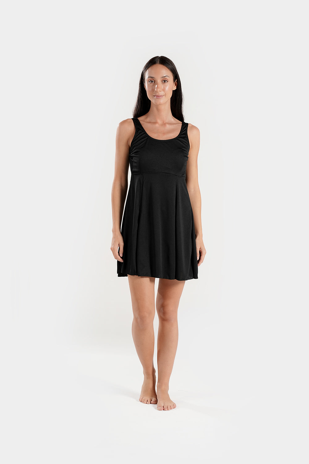 Women's BAE Modest swimming dress with built-in shorts, featuring a full-coverage modest swimwear design in navy blue fabric.
