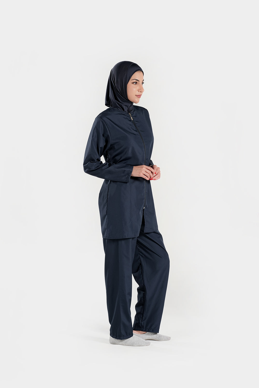 BAE Modest women's mid-length full sleeves solid color burkini with hijab, designed for modest swimwear, in navy blue.