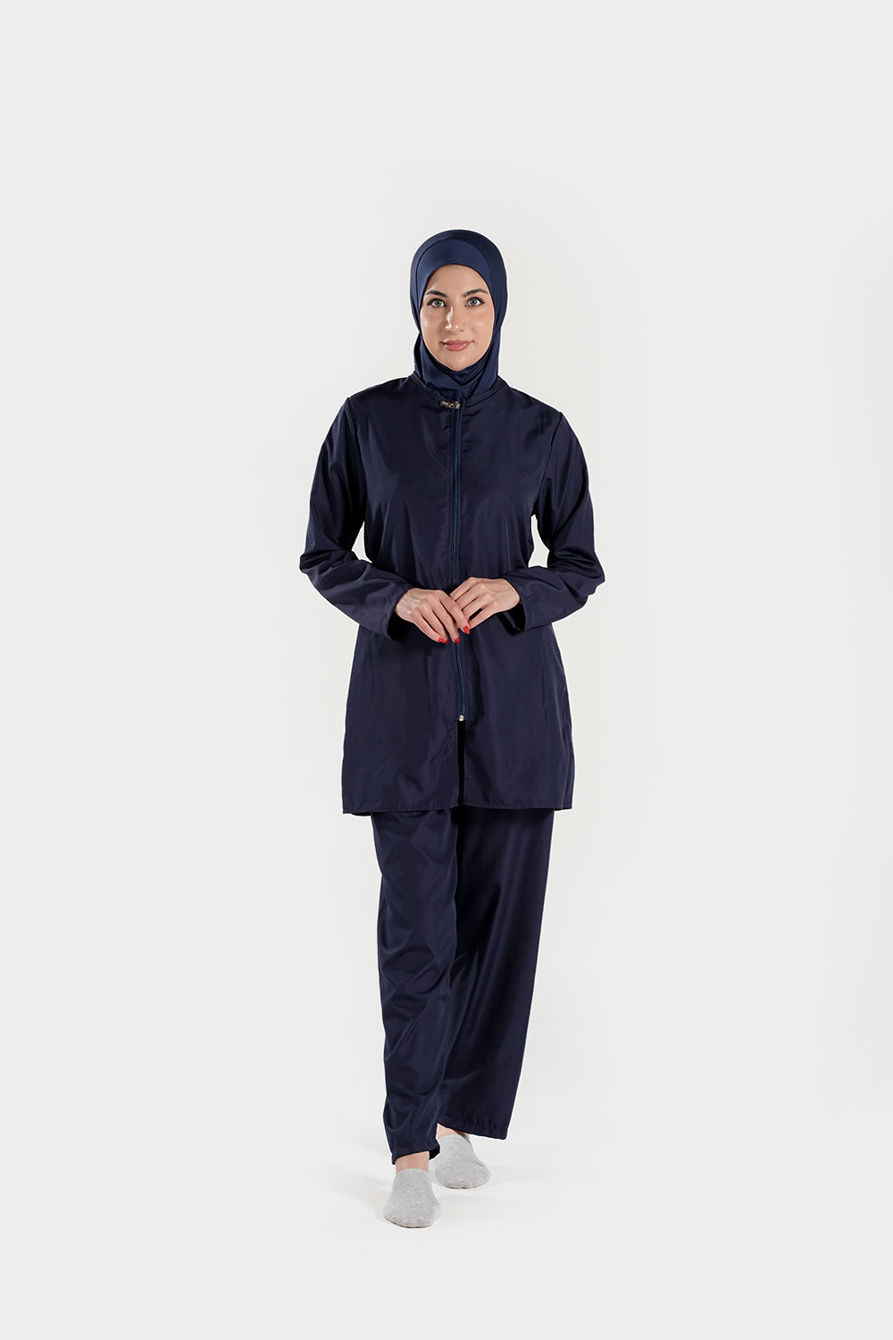 Blue BAE Modest women's burkini with full sleeves and hijab, designed for modest swimwear, shown on a model.