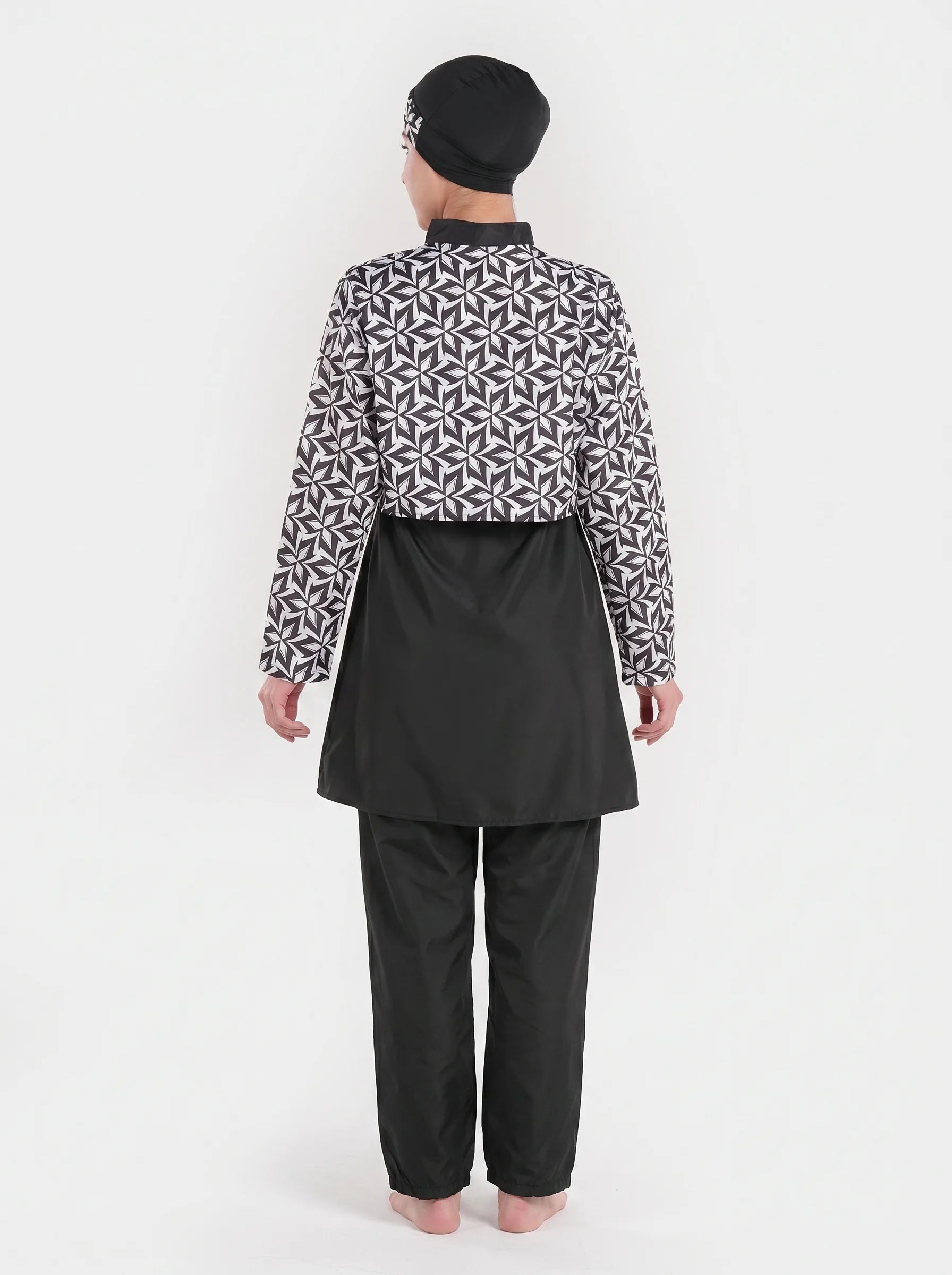 Three-piece monochrome leaf print modest swimwear set by BAE Modest featuring waterproof fabric and full coverage design.