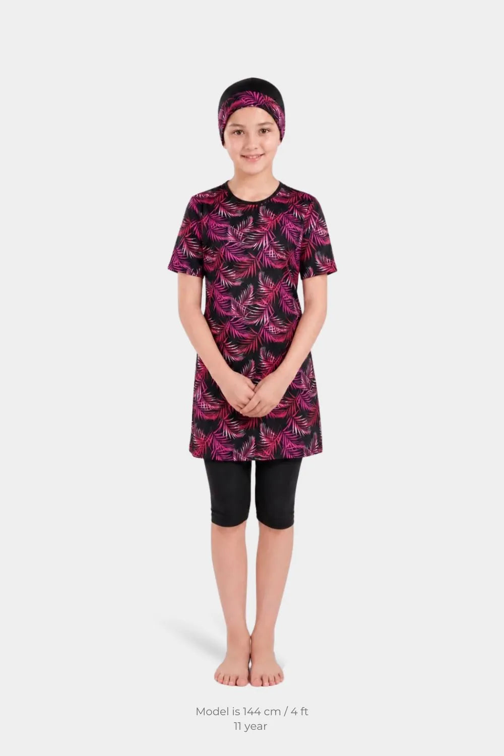 Girl’s leaf printed BAE Modest girls' lycra swimwear, featuring a colorful leaf pattern and comfortable fit for swimming.