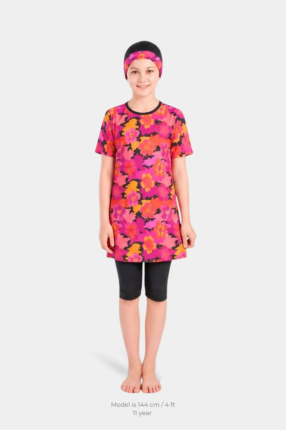 Girls' floral bloom lycra swimwear by BAE Modest featuring a colorful floral pattern and modest design for swimming or beachwear.