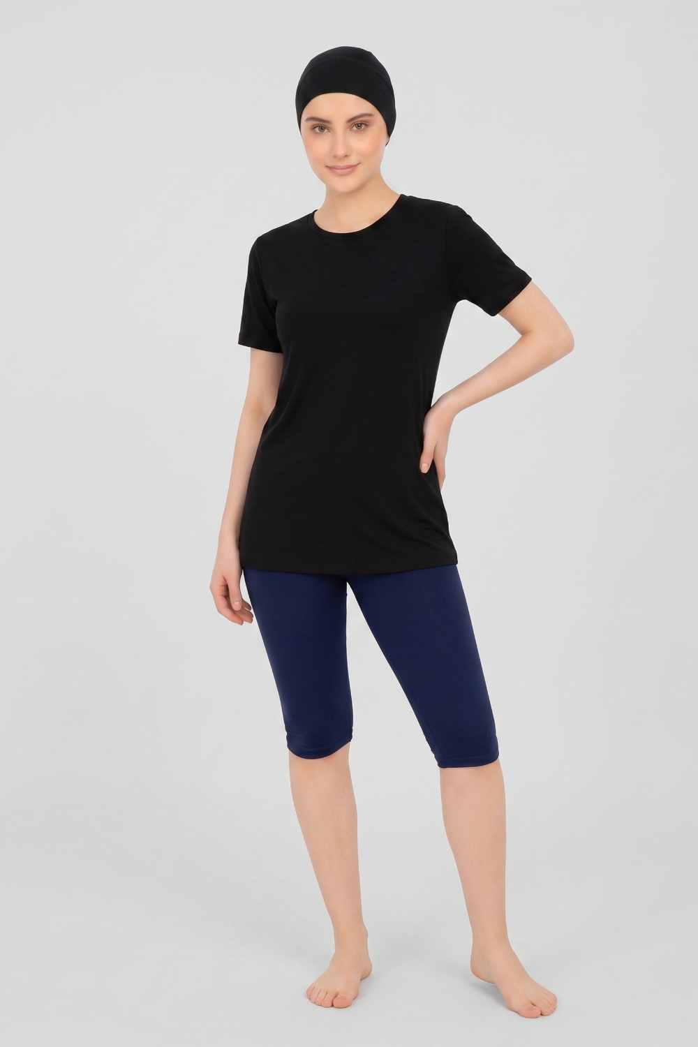 Close-up of BAE Modest short-sleeve swimwear top for women, showing the modest design and fabric texture.