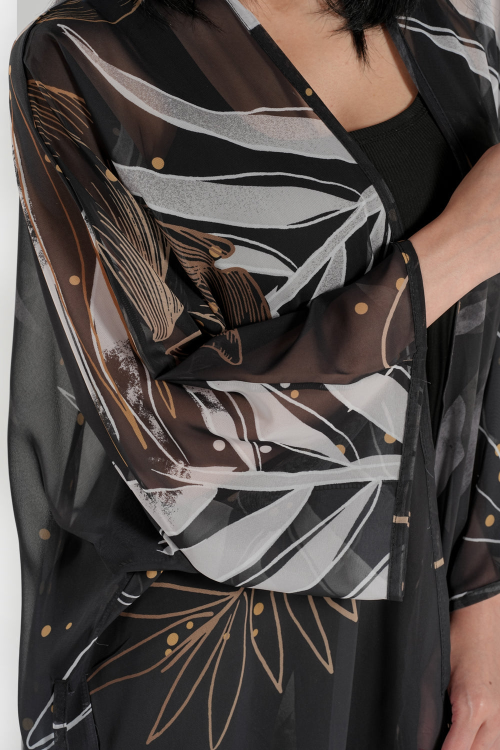 Black and white coral kimono cover-up by BAE Modest, featuring flowing fabric and intricate coral print design.
