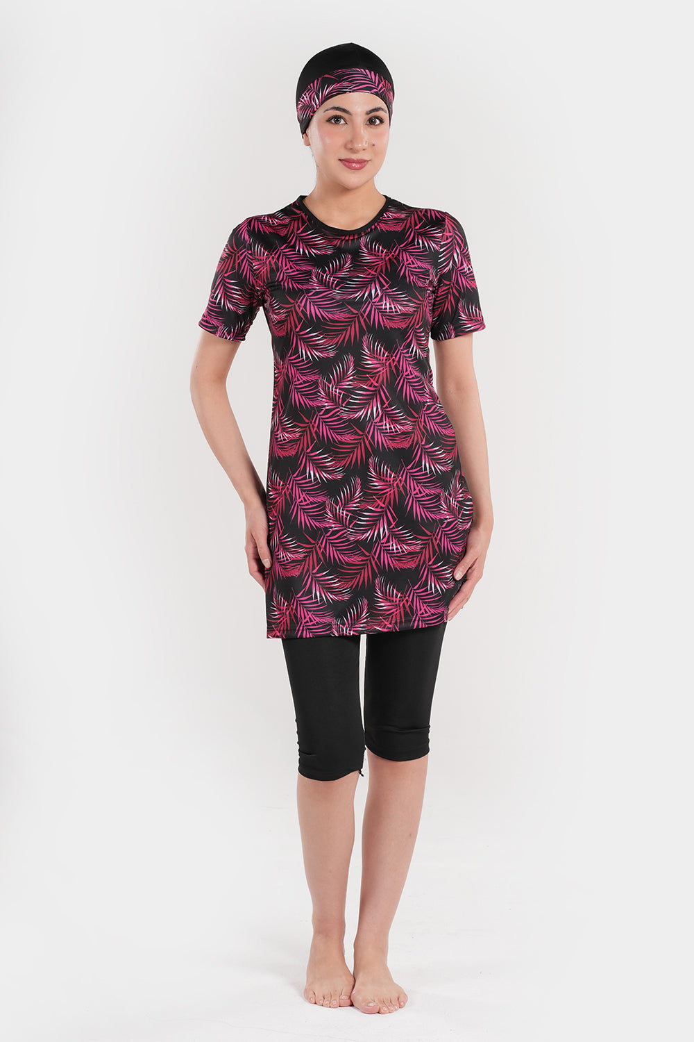 Women's leaf printed short-sleeve swimwear by BAE Modest, featuring a stylish and comfortable design for beach or pool.