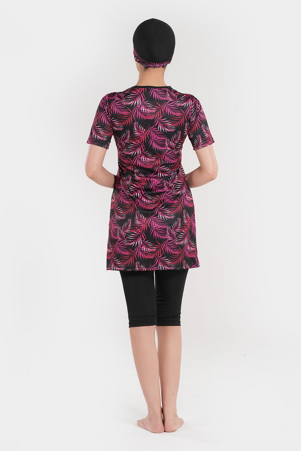 Women’s leaf printed short-sleeve swimwear by BAE Modest, featuring a stylish leafy pattern and comfortable fit.