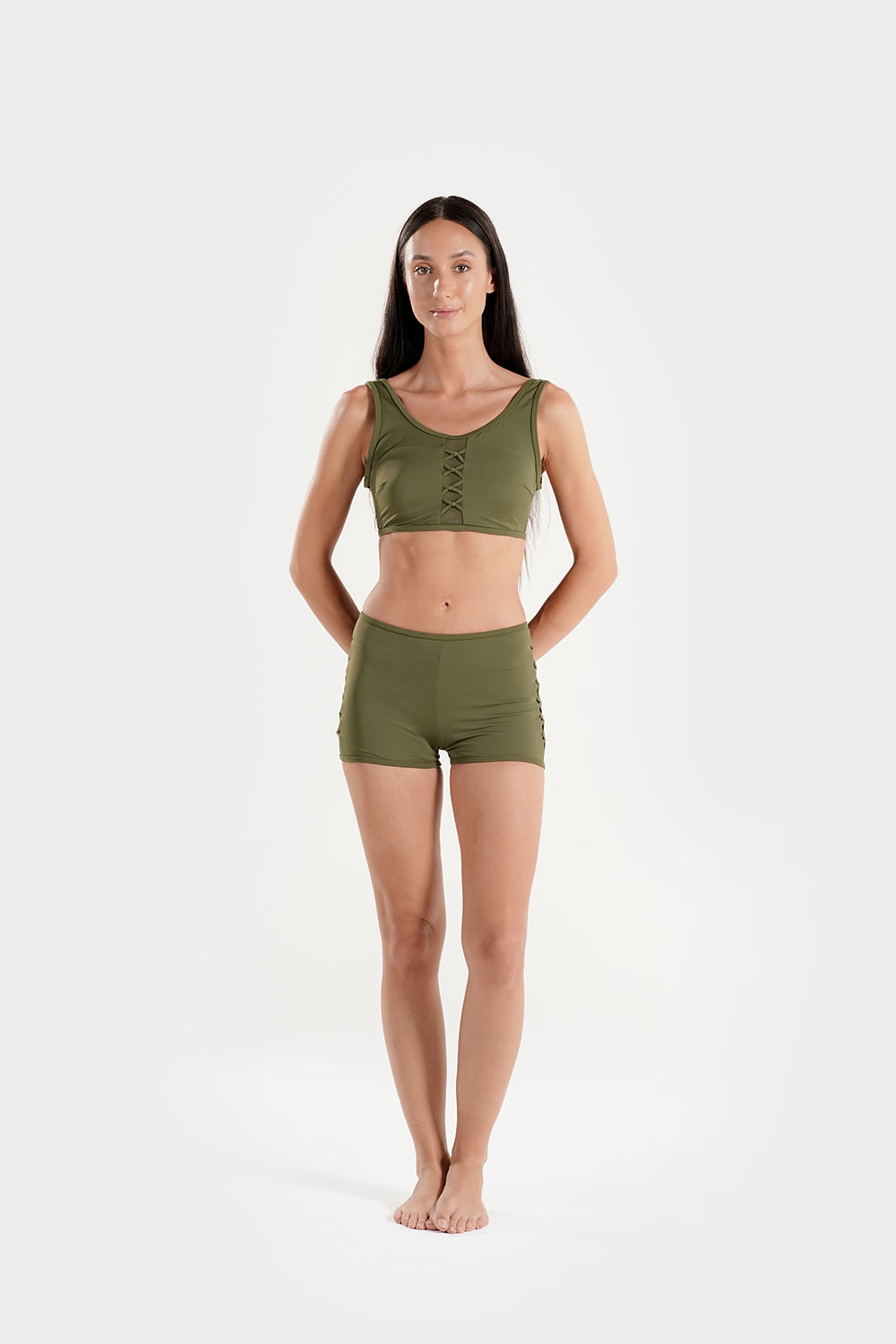 Women’s high-waisted bikini set by BAE Modest featuring lattice mesh detail and sporty shorts for a stylish swimwear look.