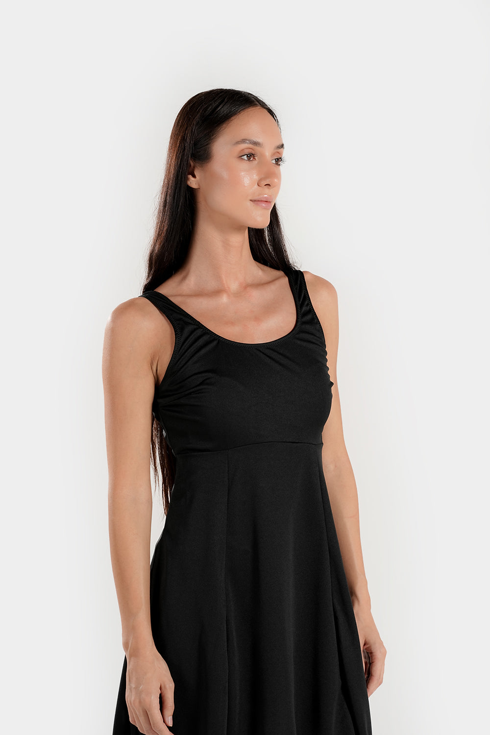 Women's modest swim dress with built-in shorts by BAE Modest, featuring full coverage and a sleek, comfortable design for swimming.