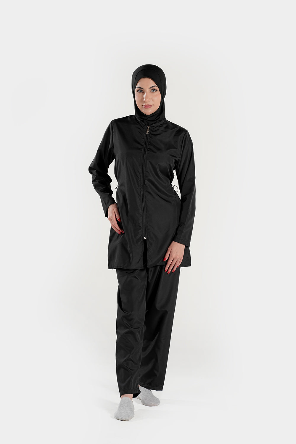 BAE Modest women's mid-length solid color burkini with full sleeves and hijab for modest swimming attire.