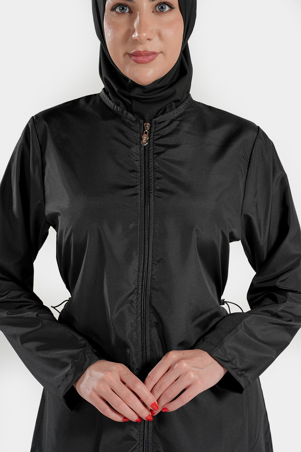 BAE Modest women's burkini with mid-length sleeves, solid color, full coverage design, includes hijab for modest swimwear.