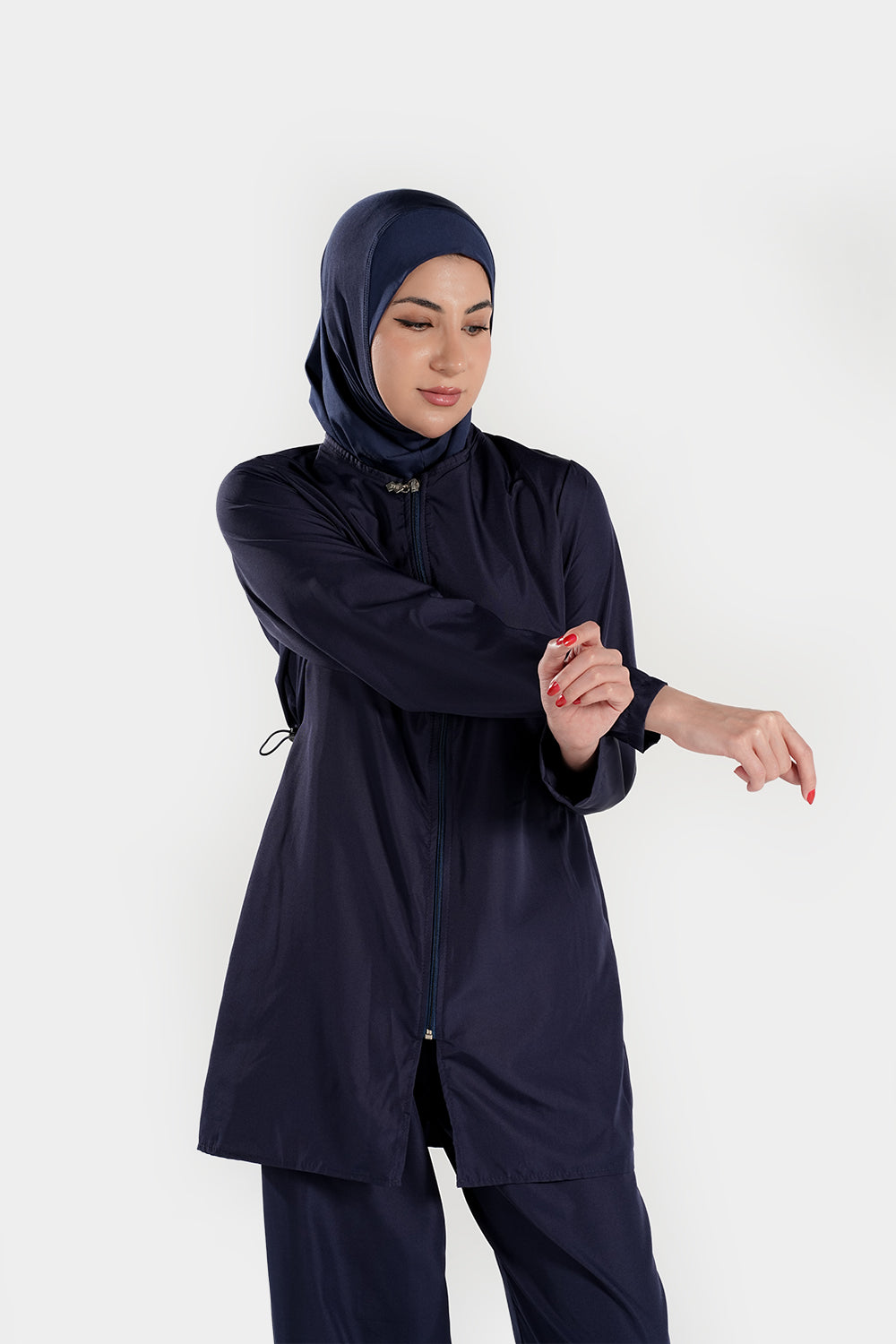 BAE Modest women's mid-length solid color burkini with full sleeves and hijab, designed for modest swimwear, shown in image.