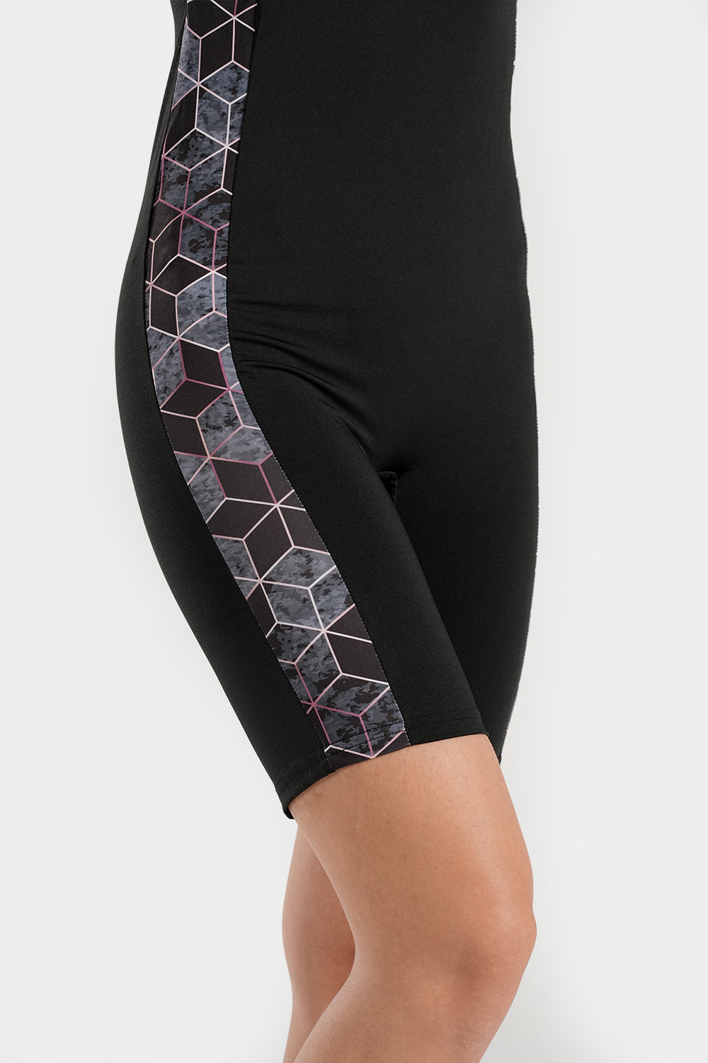 Women’s slimming side-panel swimsuit by BAE Modest featuring a sleek design and supportive fit for active beachwear.