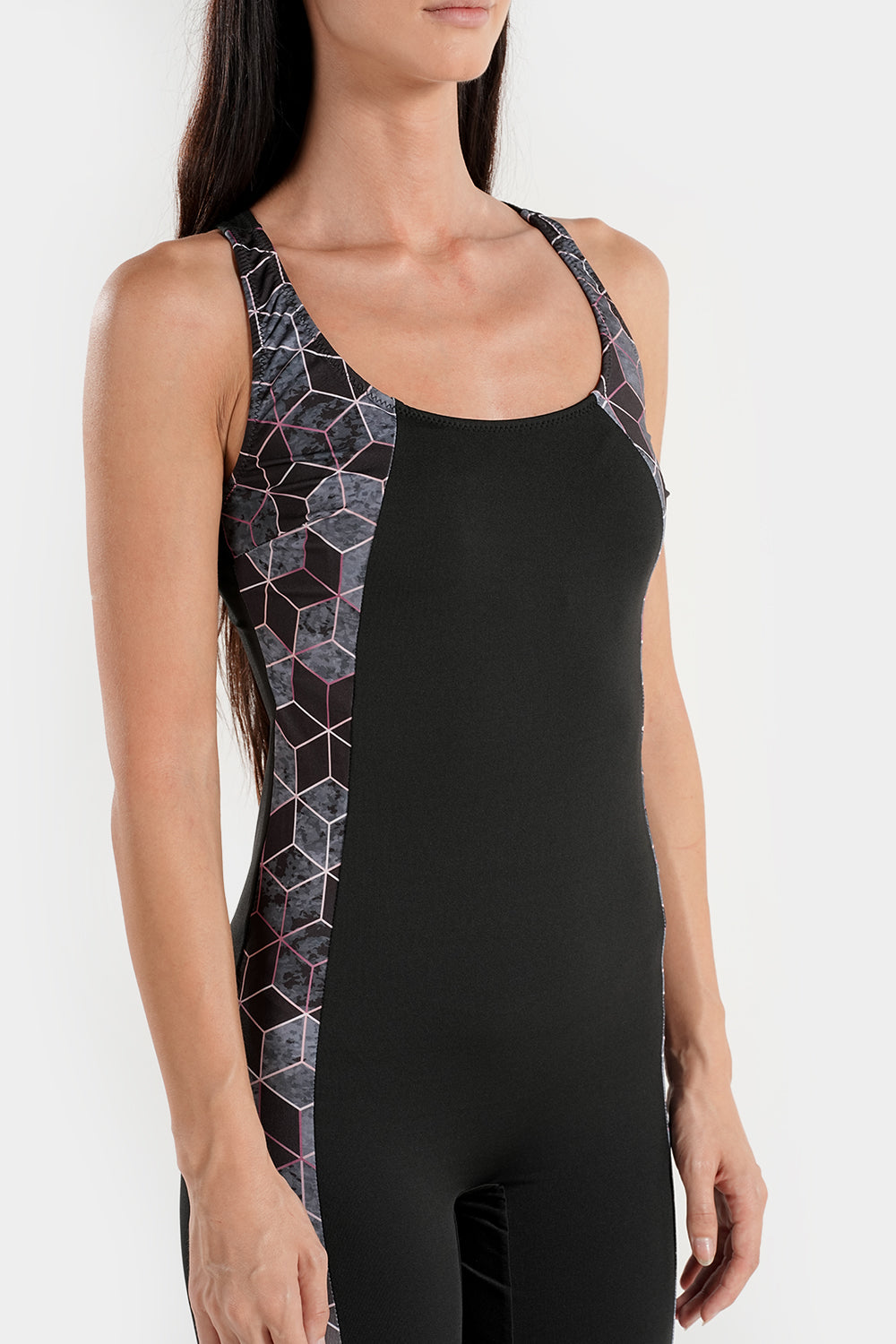 Women’s slimming side-panel swimsuit by BAE Modest, featuring a sleek design and supportive fit for a stylish beach look.